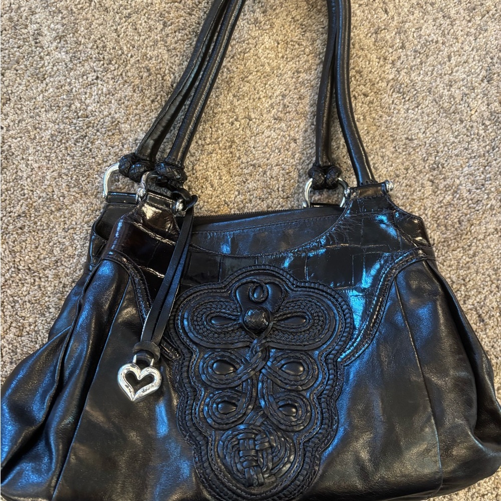 Elegant Black Handbag with Heart Charm